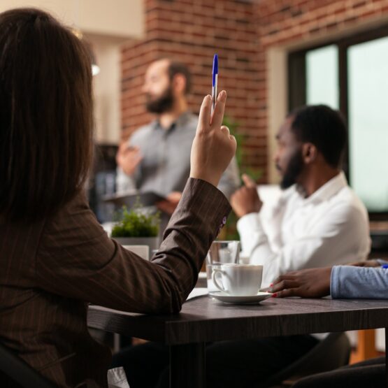 Diverse businesspeople working at management presentation